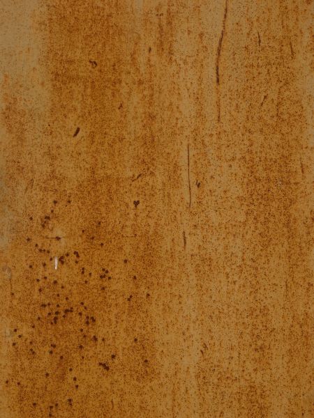 White metal texture, covered by areas of small, deep red rust spots. Several rusted scratches and larger spots are also visible.